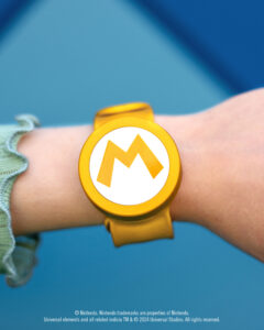 A highlight of the one-year celebration of SUPER NINTENDO WORLD at Universal Studios Hollywood includes a commemorative, special release Golden Power-Up Band, available February 17, 2024.